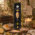 Incenso Sagrada Madre Tarot Gem Citrino: confezione nera con cristallo giallo illustrato e bastoncino giallo verde.